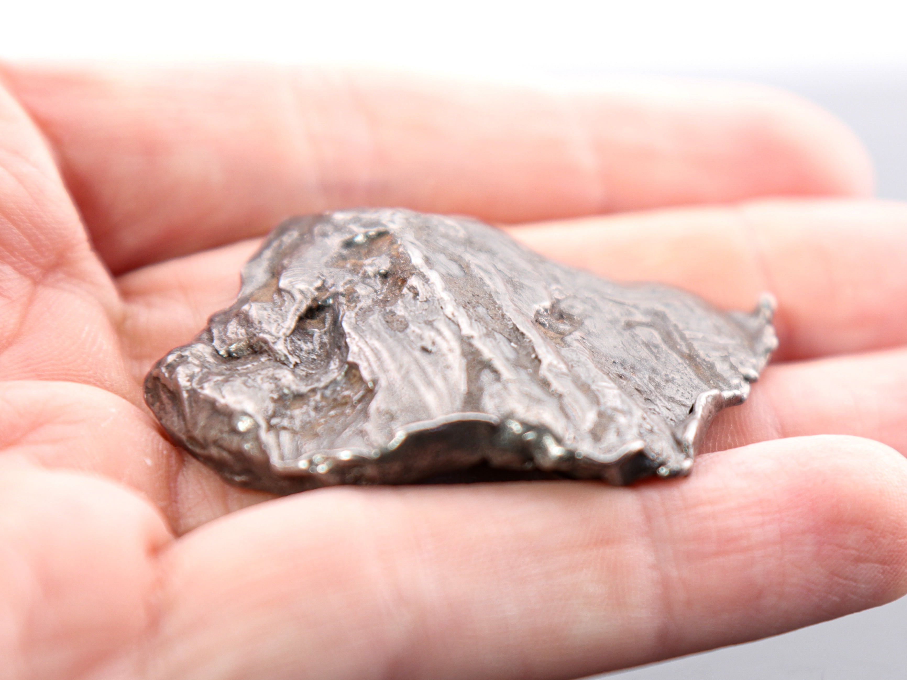 Gebel Kamil Iron Meteorite (Cleaned) Oriented Shield Shape with Shear Lines - 49.05 grams