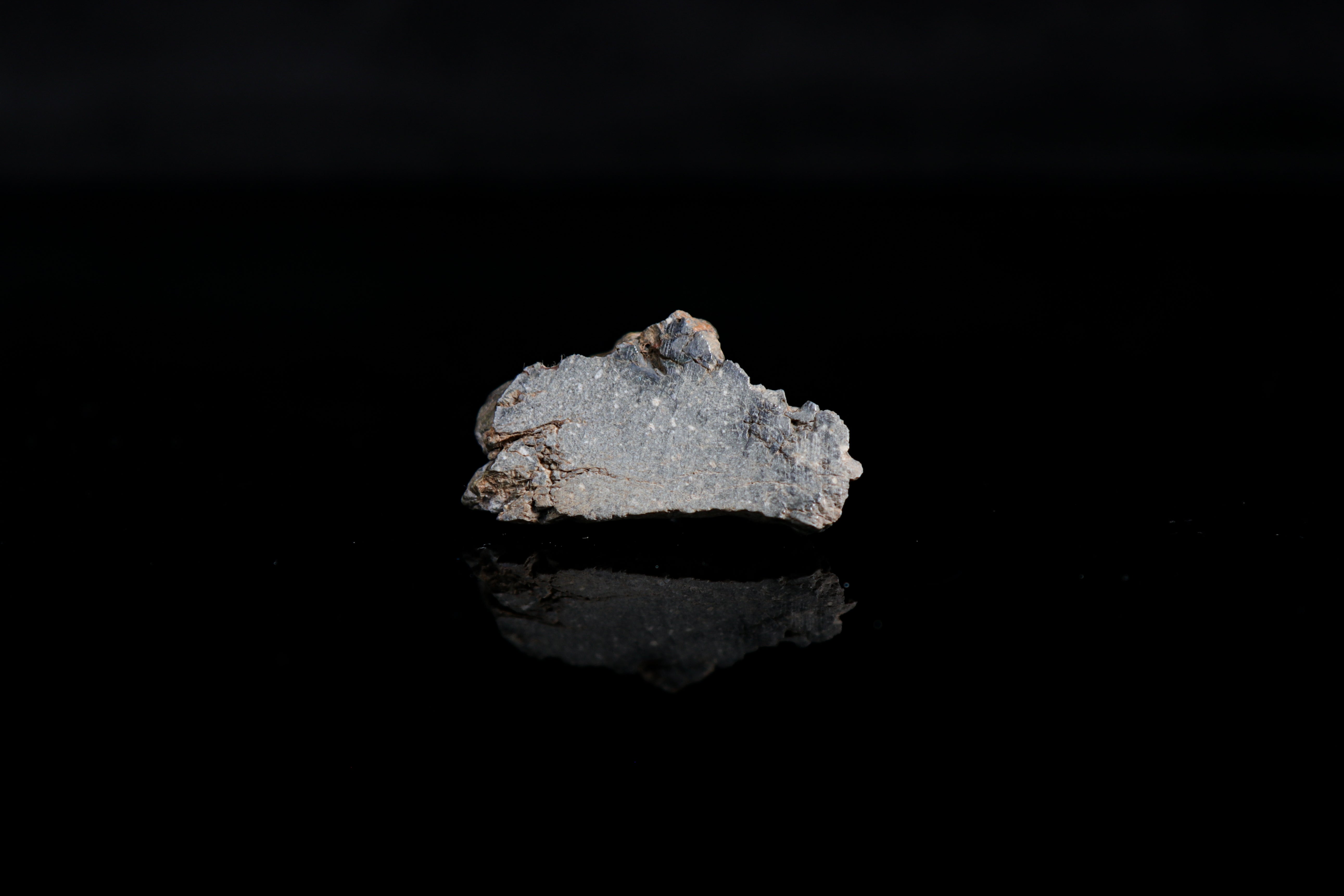 Gadamis 003 Lunar Meteorite, Elongated Polished End Cut with Remnant Crust - 14.14 grams